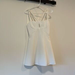 Used 
front cut out 
A line dress
Boning in back
fit and flare